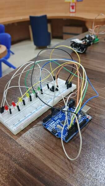 Breadboard circuit with LEDs and Arduino Uno built by a student at a STEMForge workshop