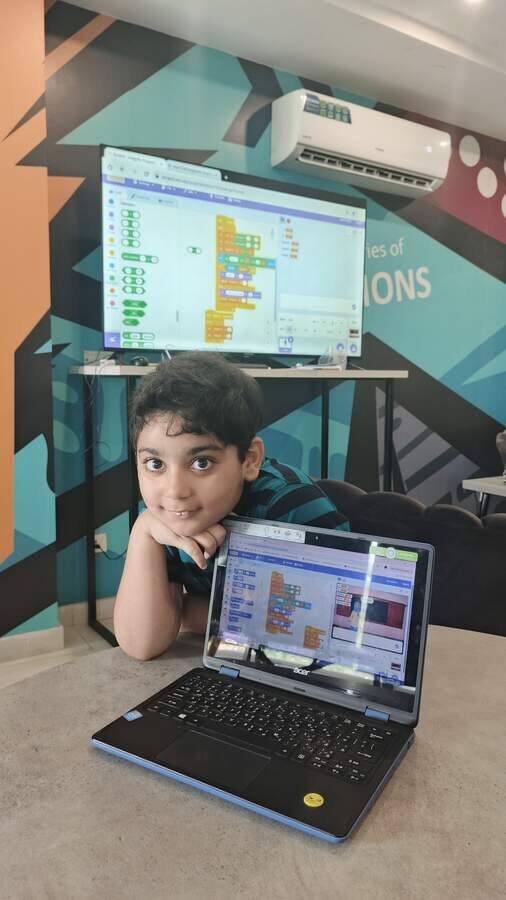 Student learning to code at a STEMForge co-working space workshop in Lahore